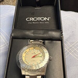 Croton Silver Bracelet Watch with Yellow Dial and Red Seconds Hand